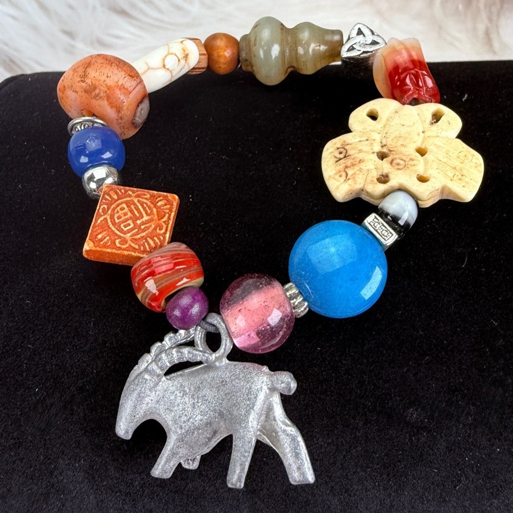 Beautiful vintage carved elephant, butterfly multicolor beaded stretch bracelet